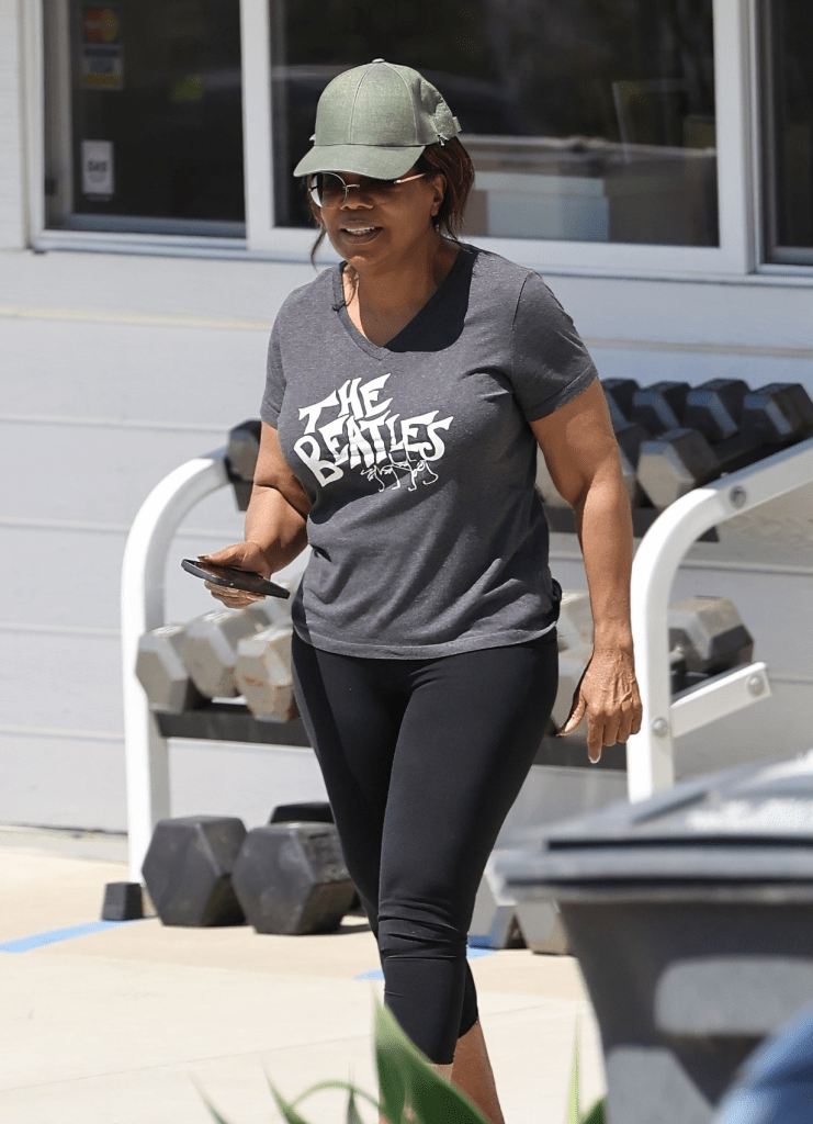 Candid shot of Oprah Winfrey without makeup leaving the gym